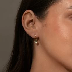 Simple Evil Eye Huggie Earrings -Uncommon James J16E SIMPLEEYEHUG GOLD M1